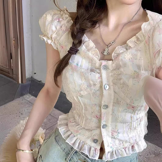 Blusa francesa de manga corta con estampado floral.