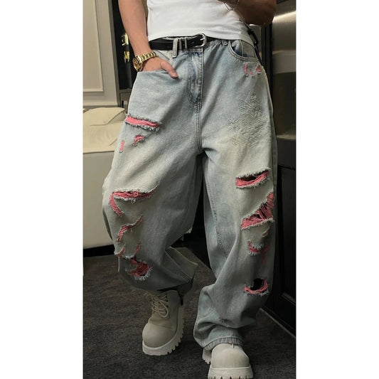 Pantalones vaqueros rectos holgados con bordado de drag�n.