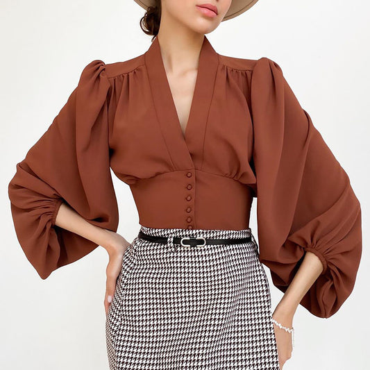 Blusa de mujer con cuello en V y mangas farol
